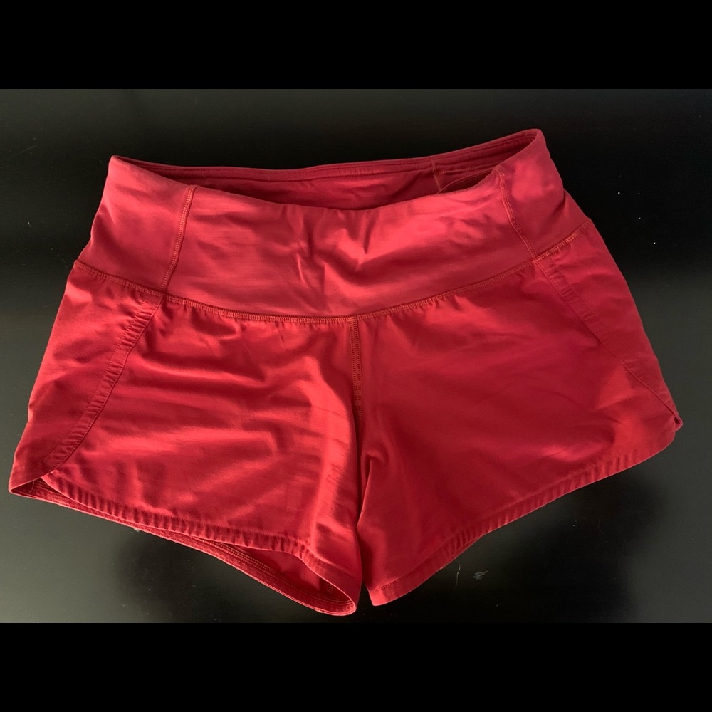 Red high waisted 2.5” lululemon shorts